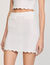 Gonna corta in maglia con perle