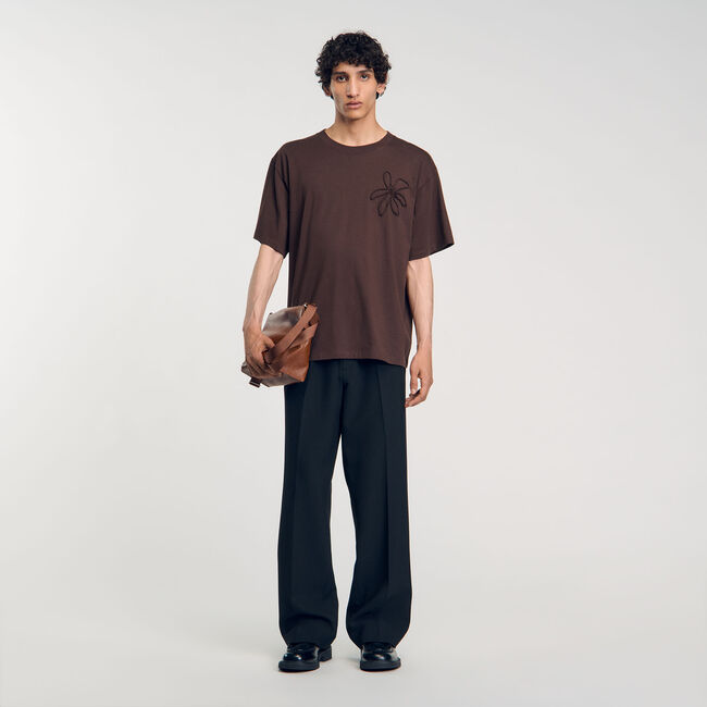 T-shirt oversize con fiore