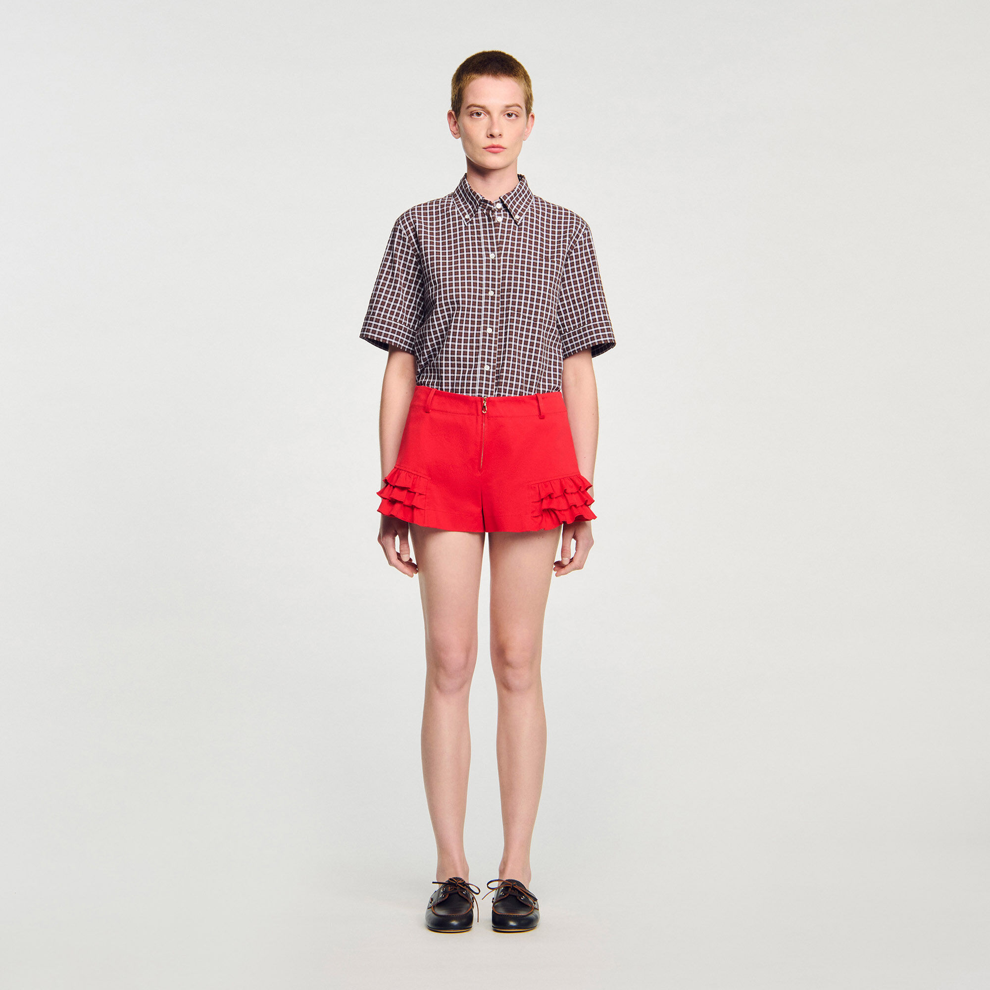 Shorts con volant