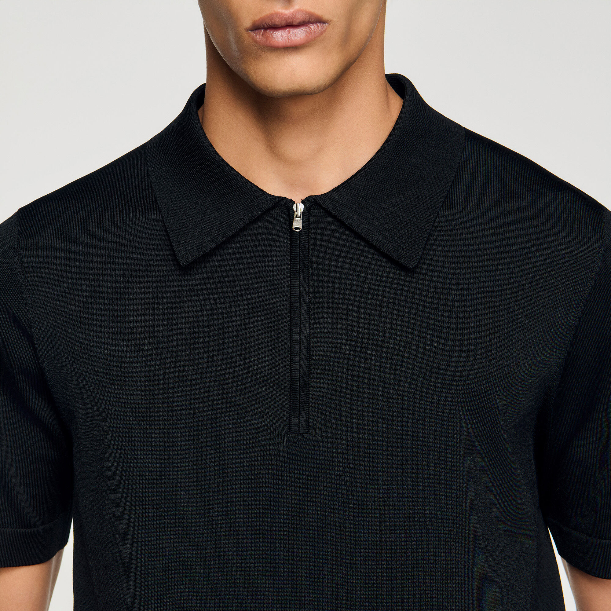 Polo in maglia con colletto con zip