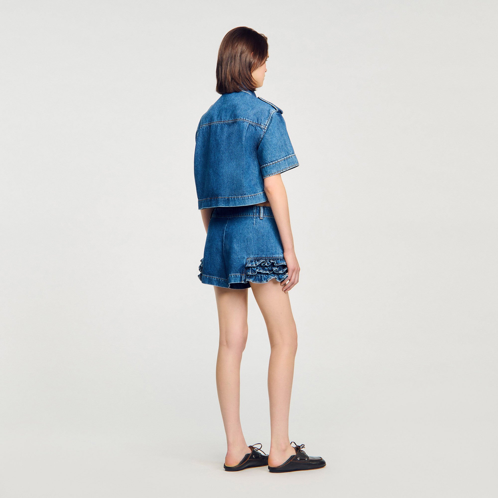 Shorts in denim con volant