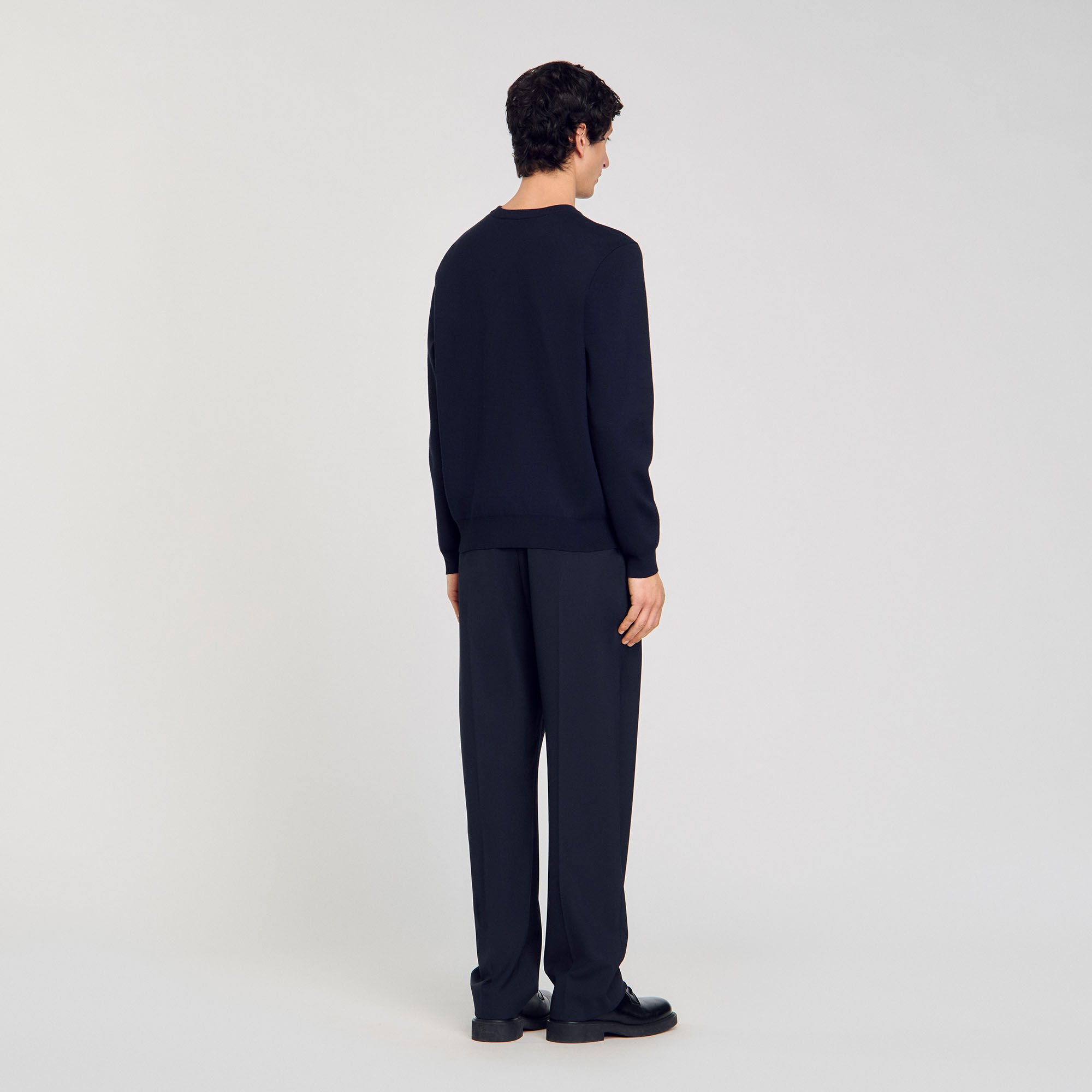 Maglione con dettaglio a fiore