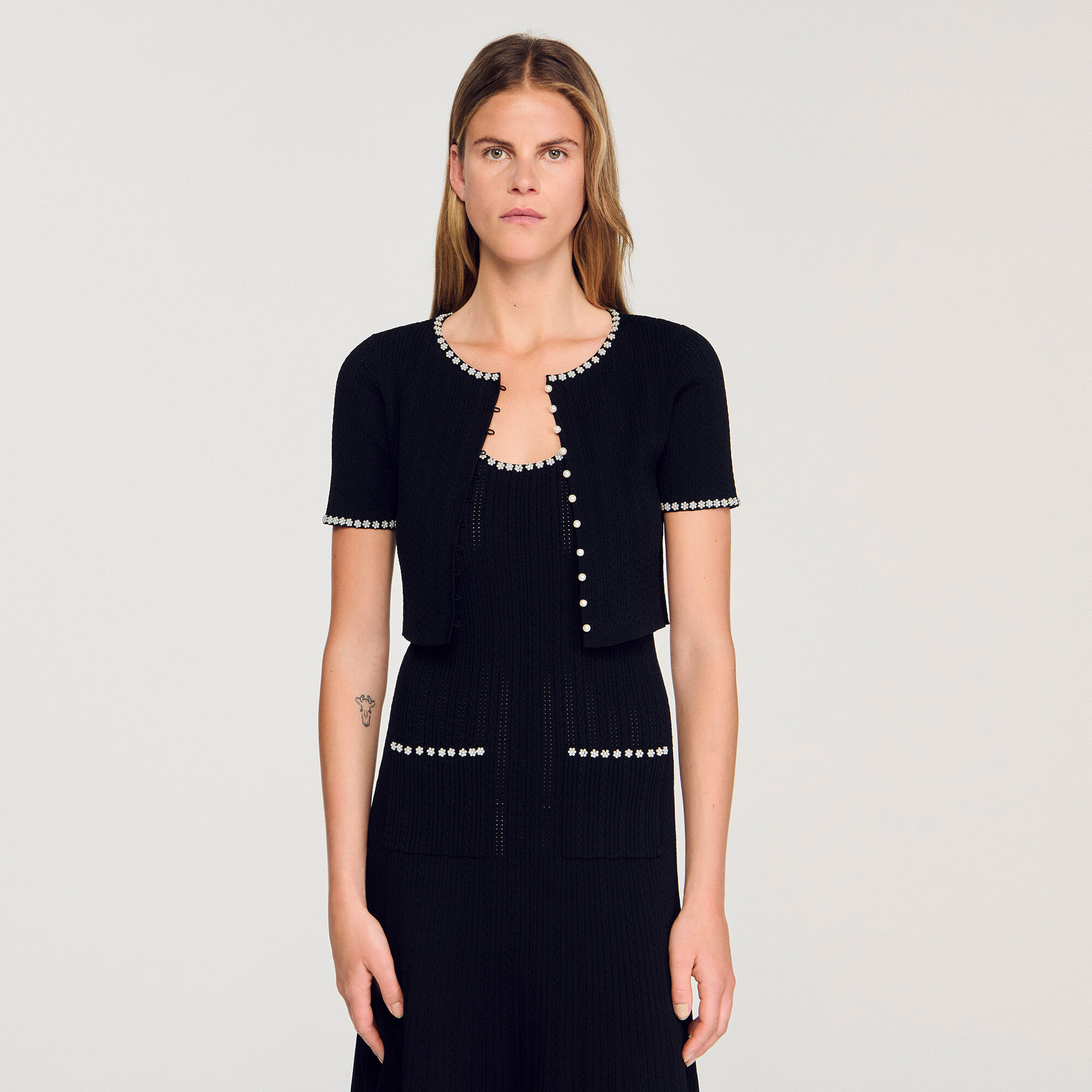 Cardigan corto con perline