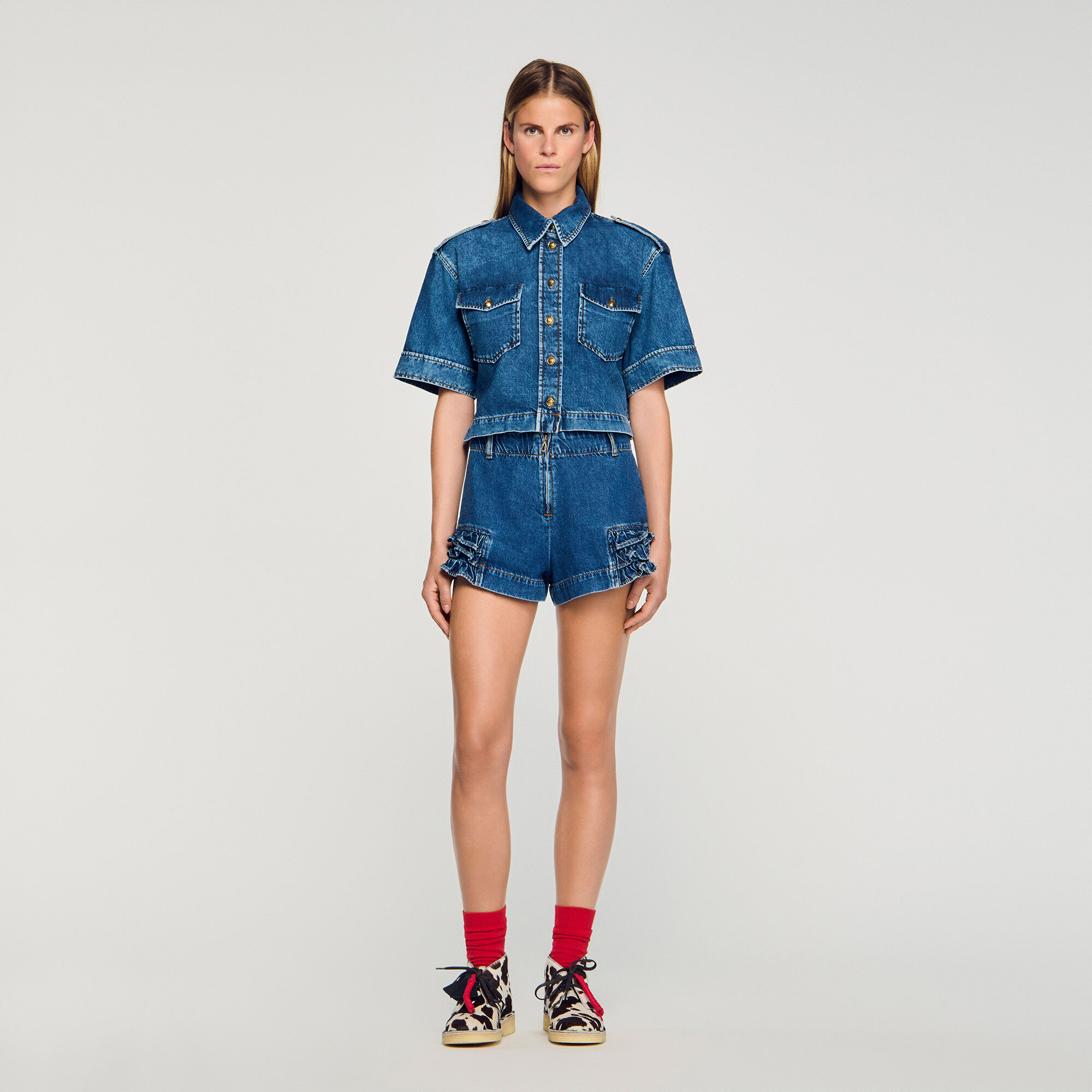 Shorts in denim con volant