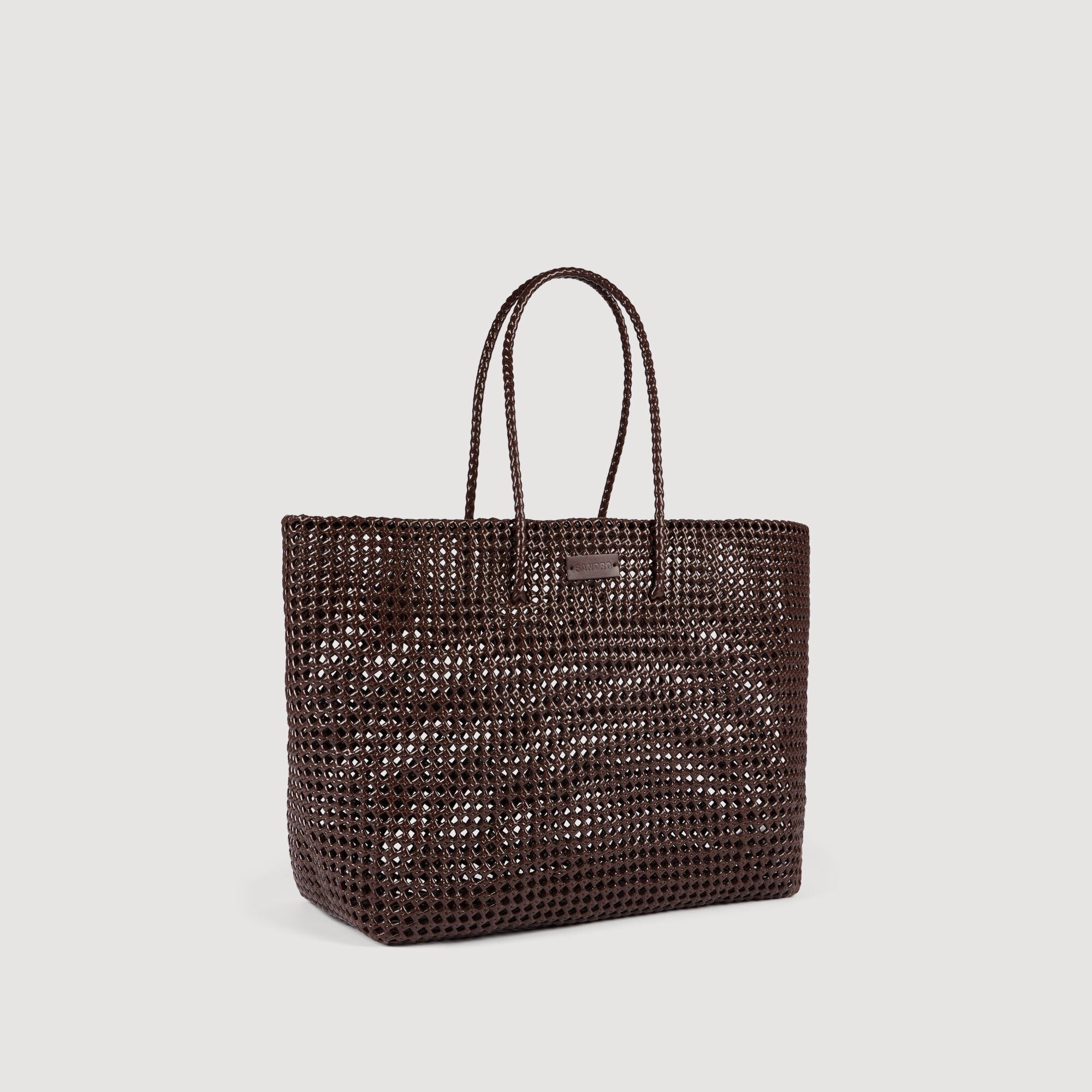 Shopping bag intrecciata con patch