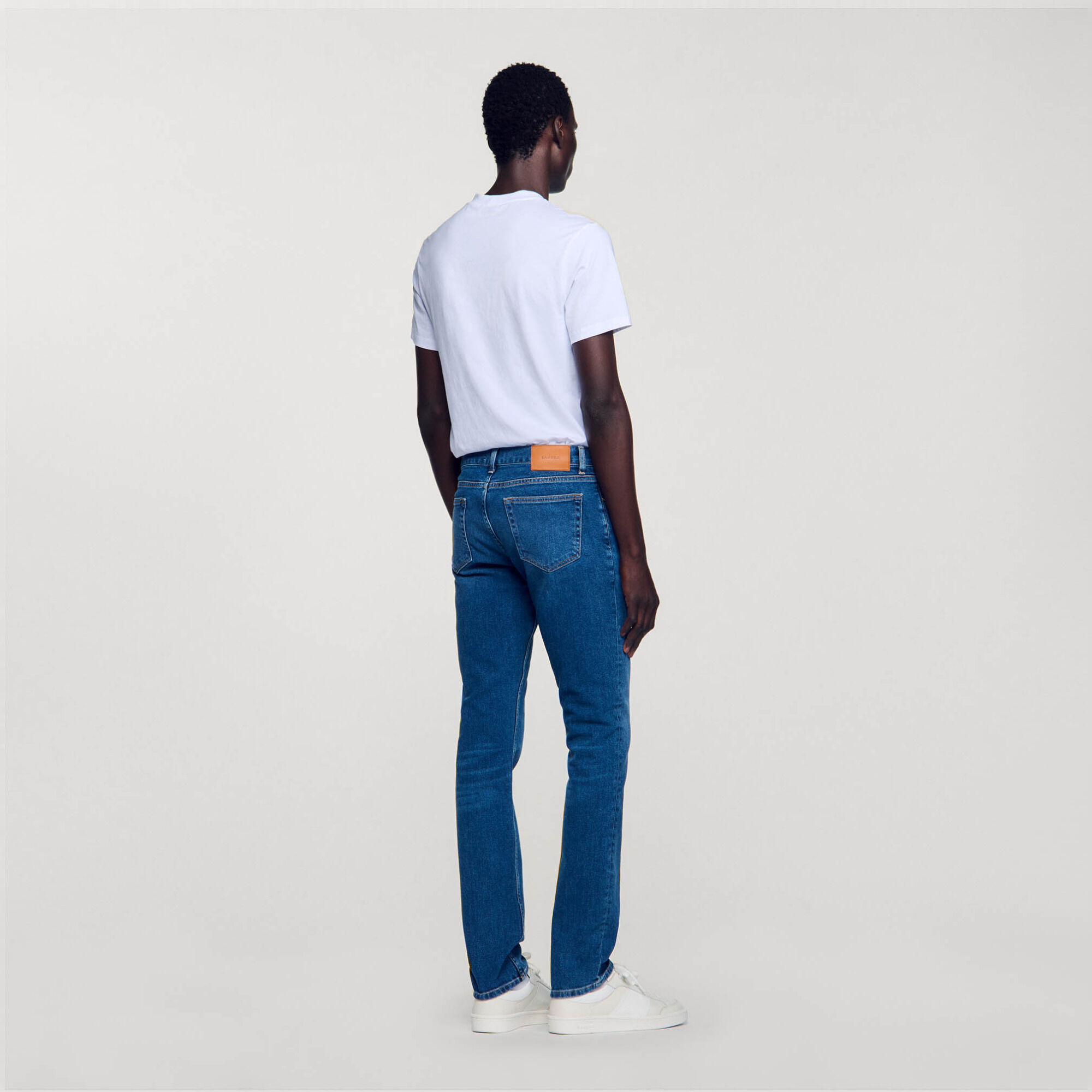 Jeans slim con lavaggio Waterless - Uomo | Sandro
