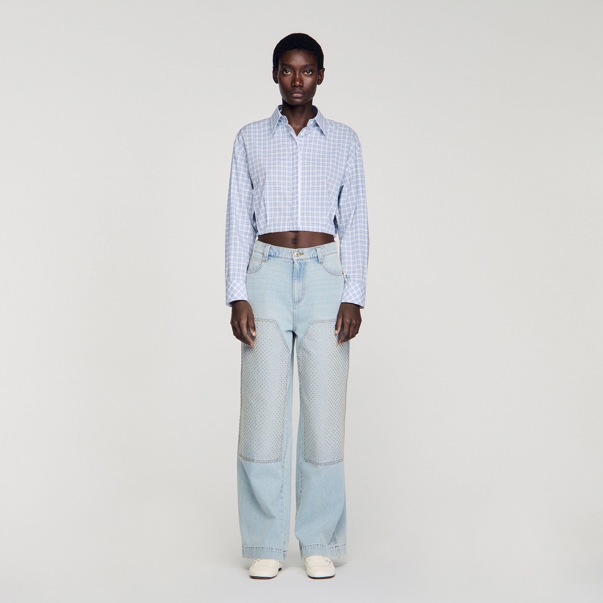 Jeans dritti d&eacute;lav&eacute; patch strass