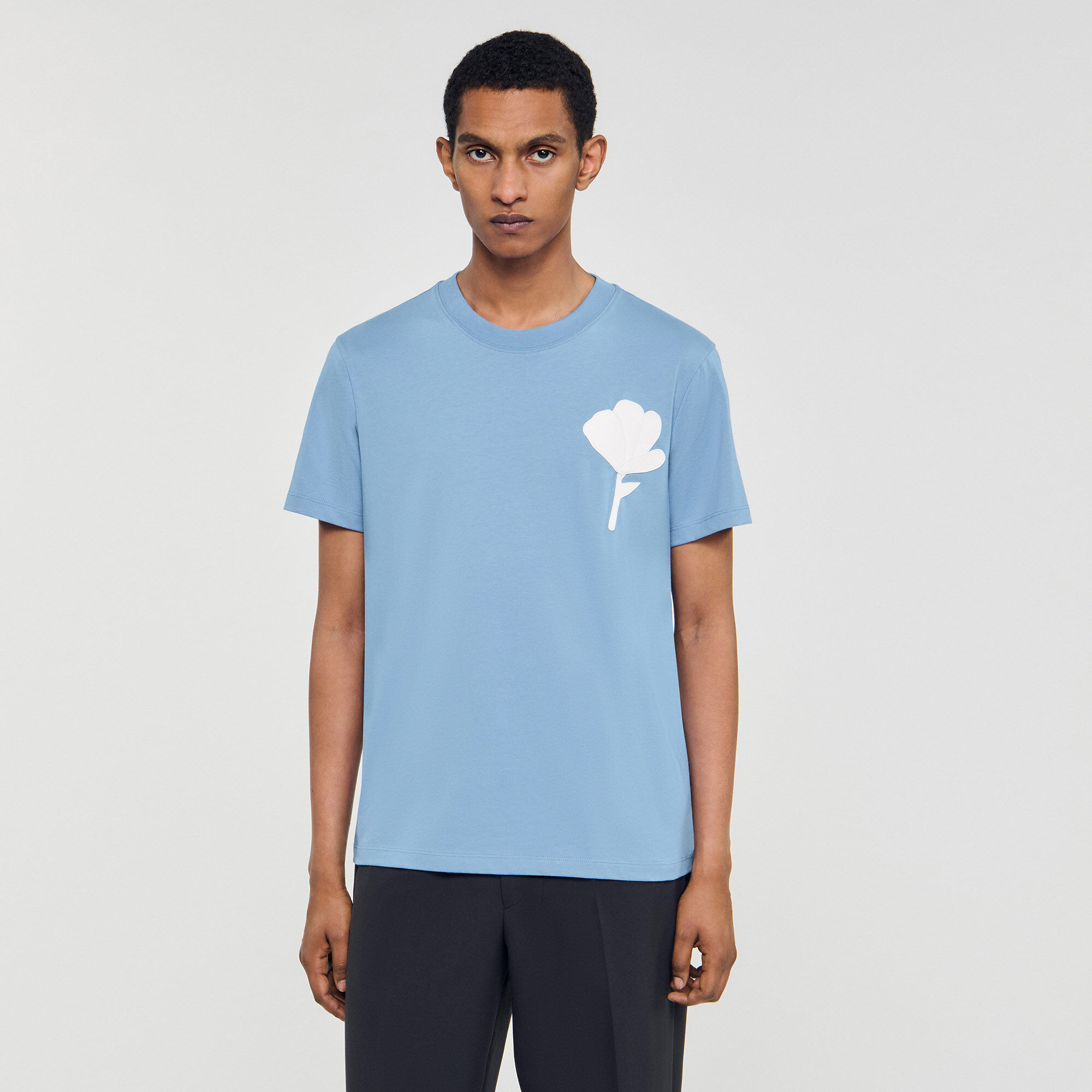 T-shirt con inserto a fiore