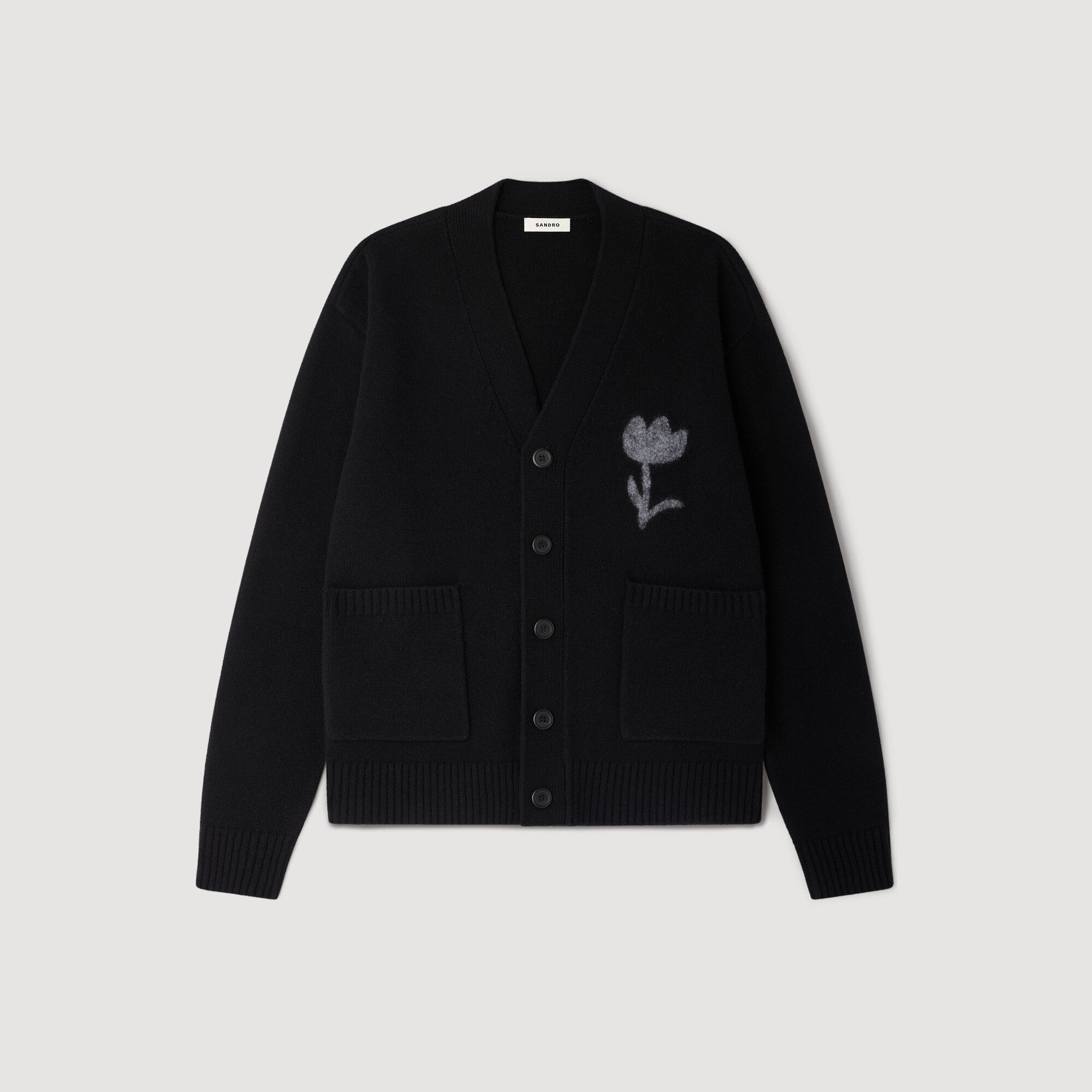 Cardigan con fiore