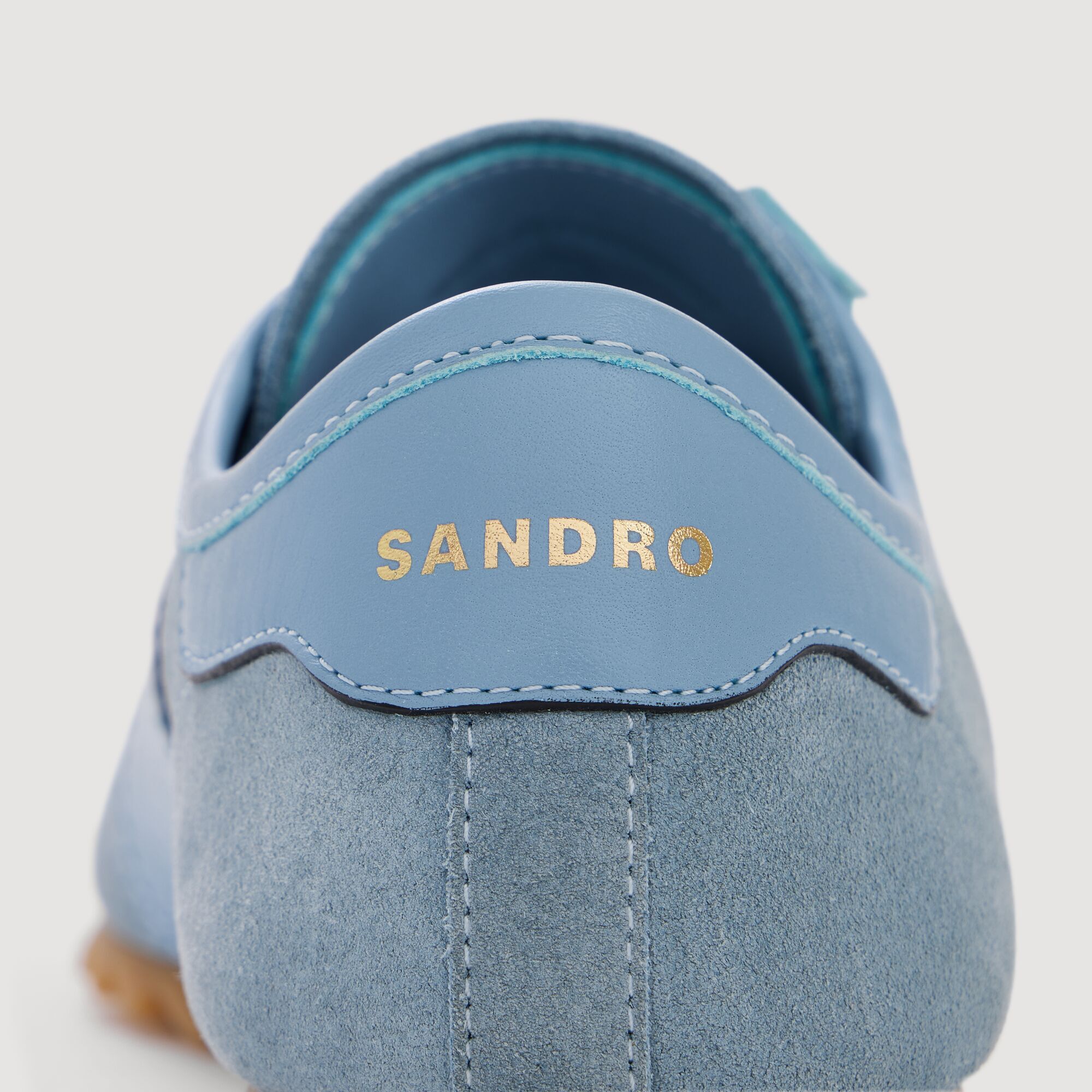 Sneakers basse in pelle e camoscio