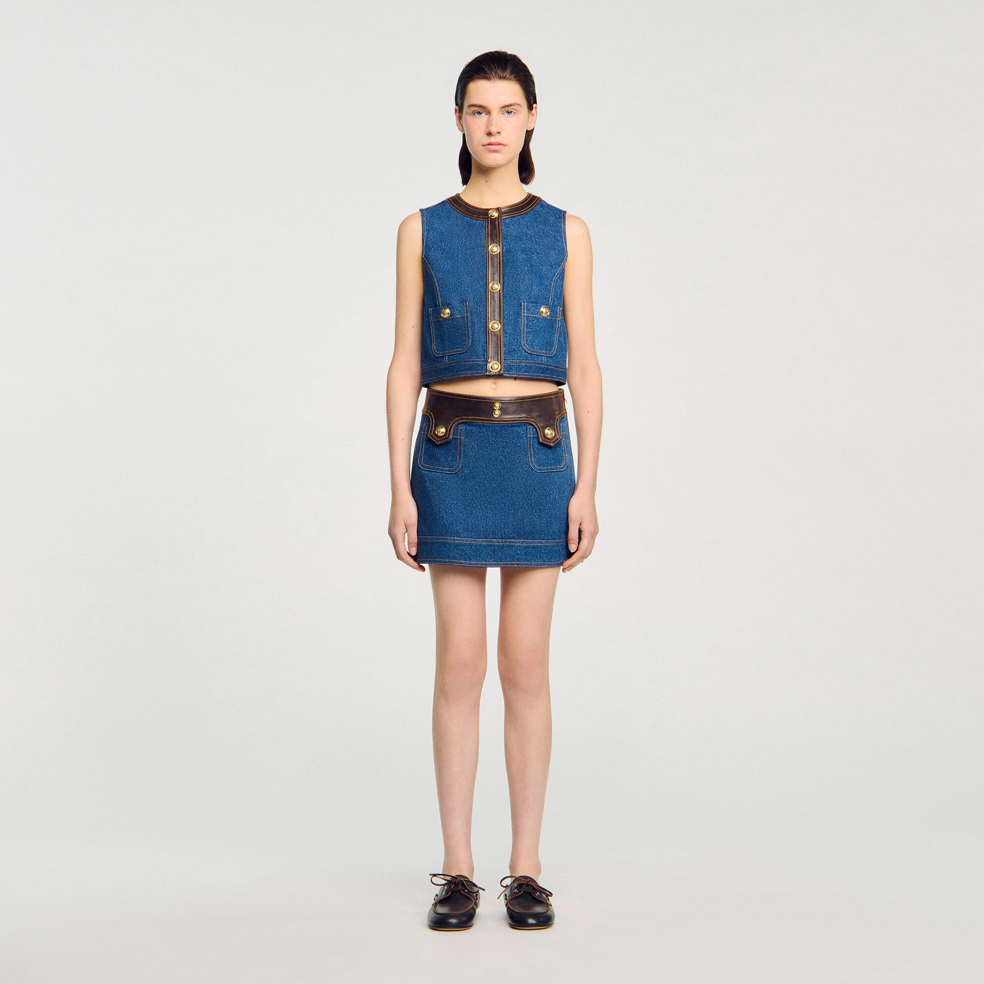 Top in denim e pelle