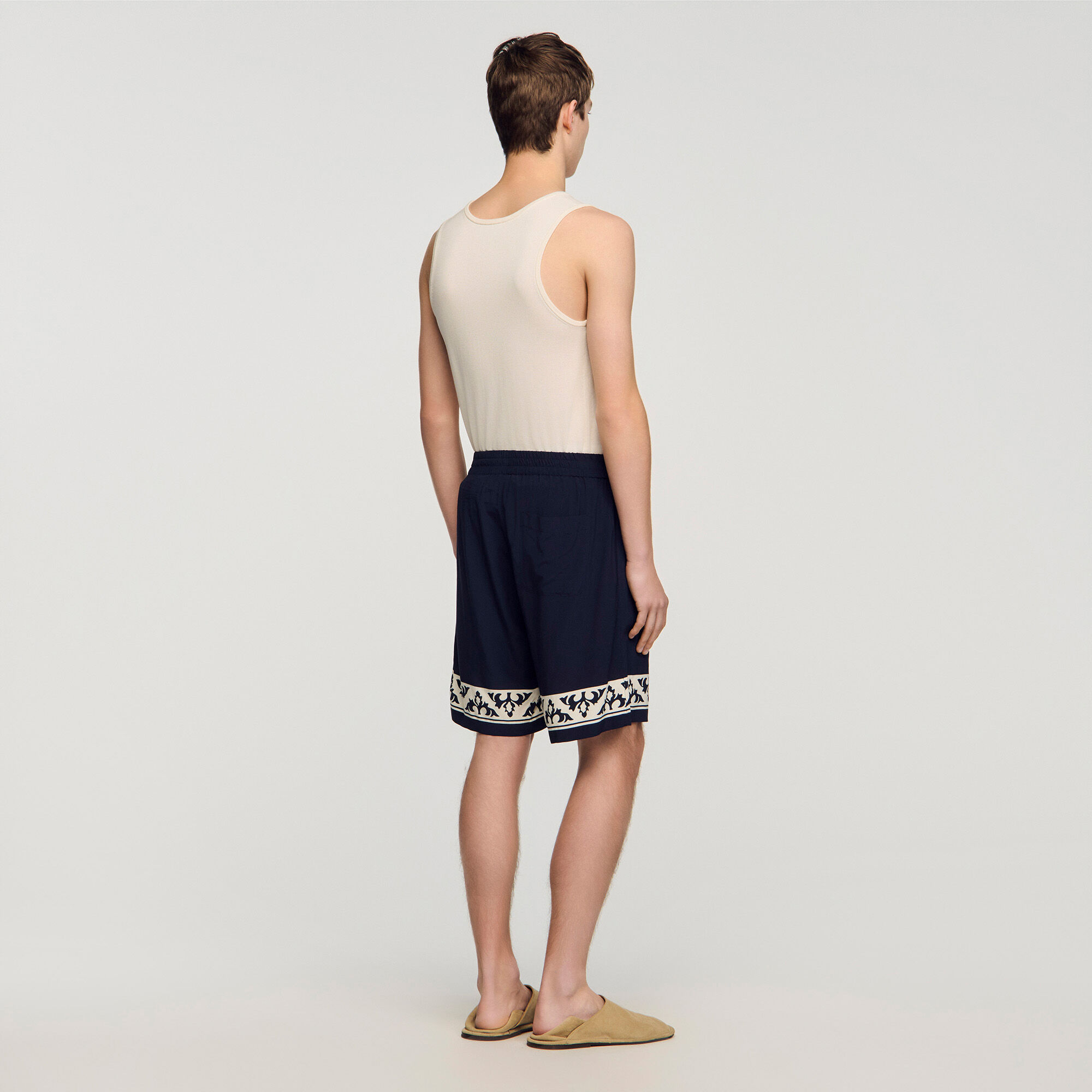 Shorts fluidi motivo a contrasto