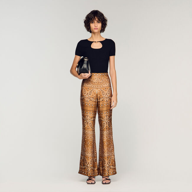 Maglione con collo traforato