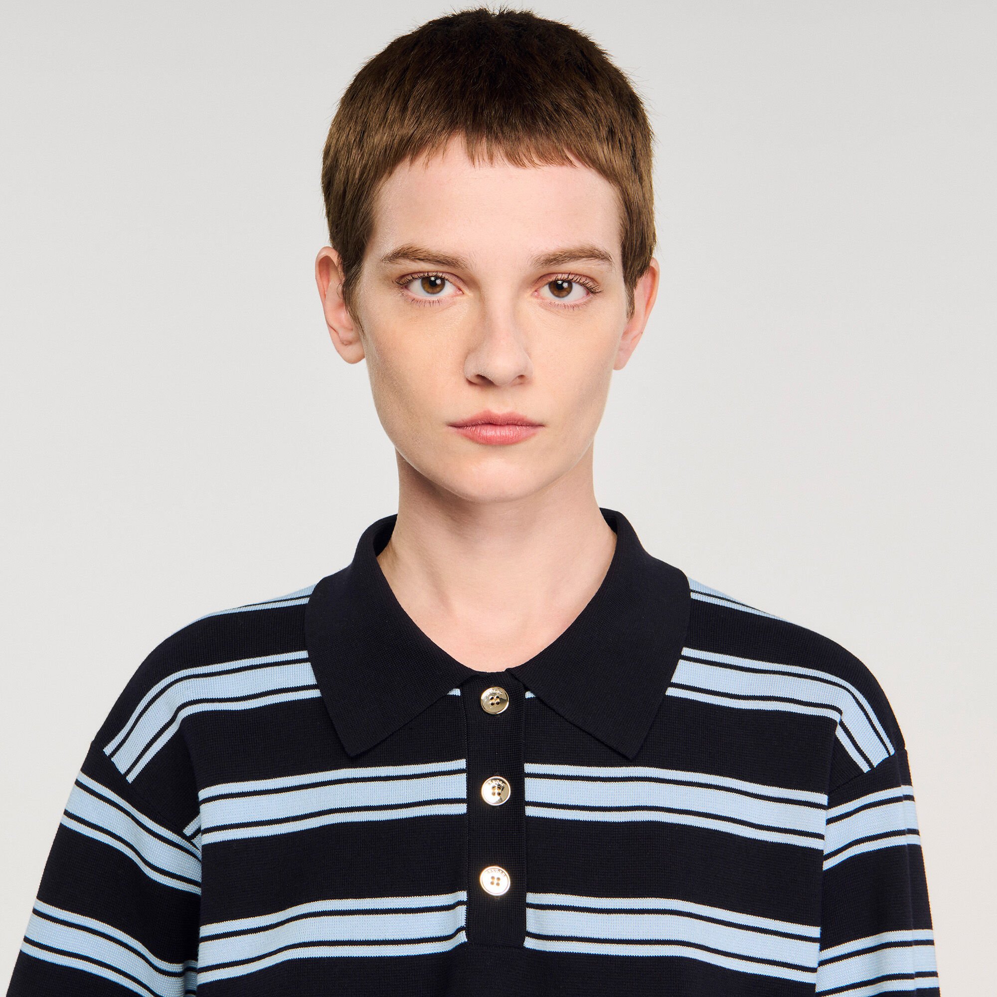 Maglione polo a righe