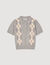 Maglione a rombi con colletto polo