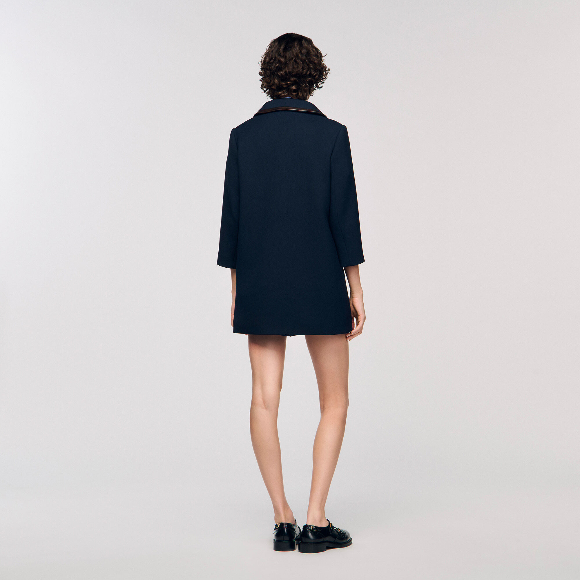 Cappotto con fasce in pelle
