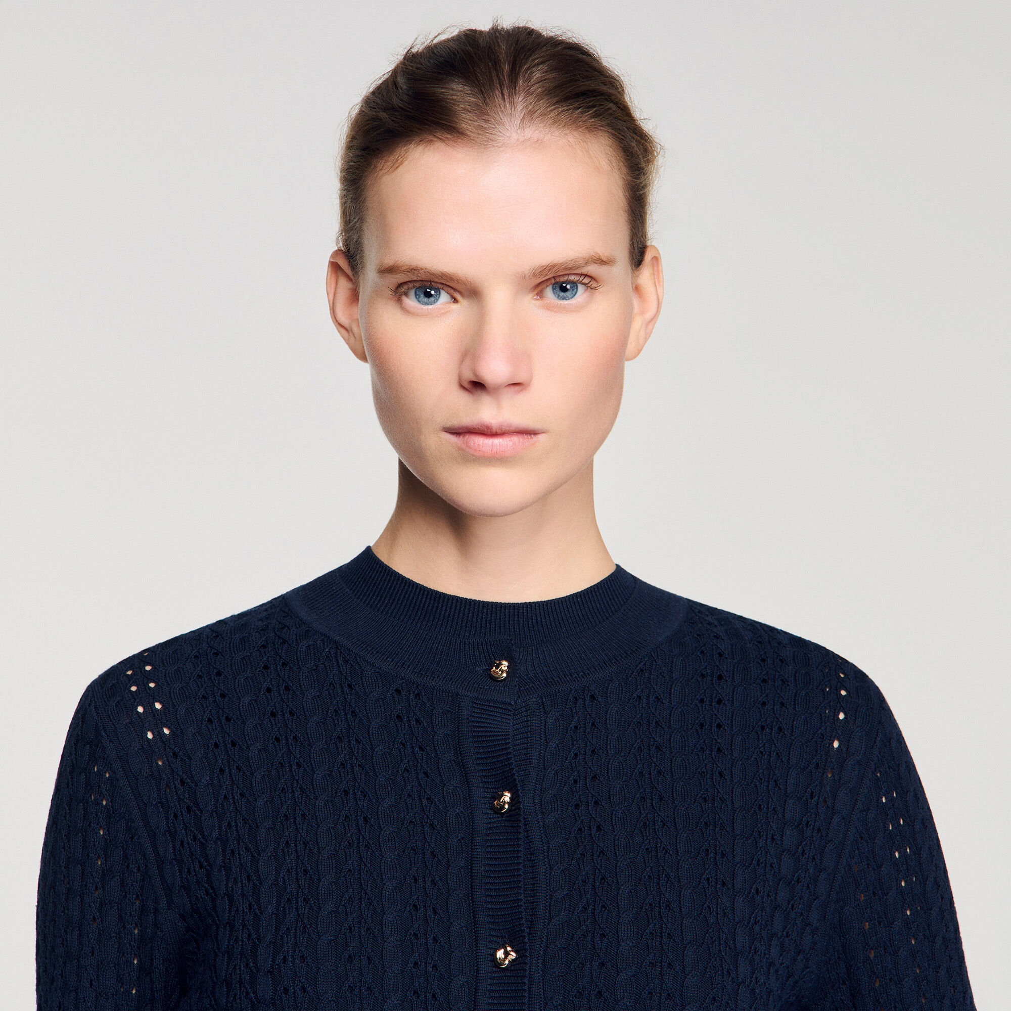 Cardigan corto in maglia lavorata