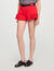 Shorts con volant
