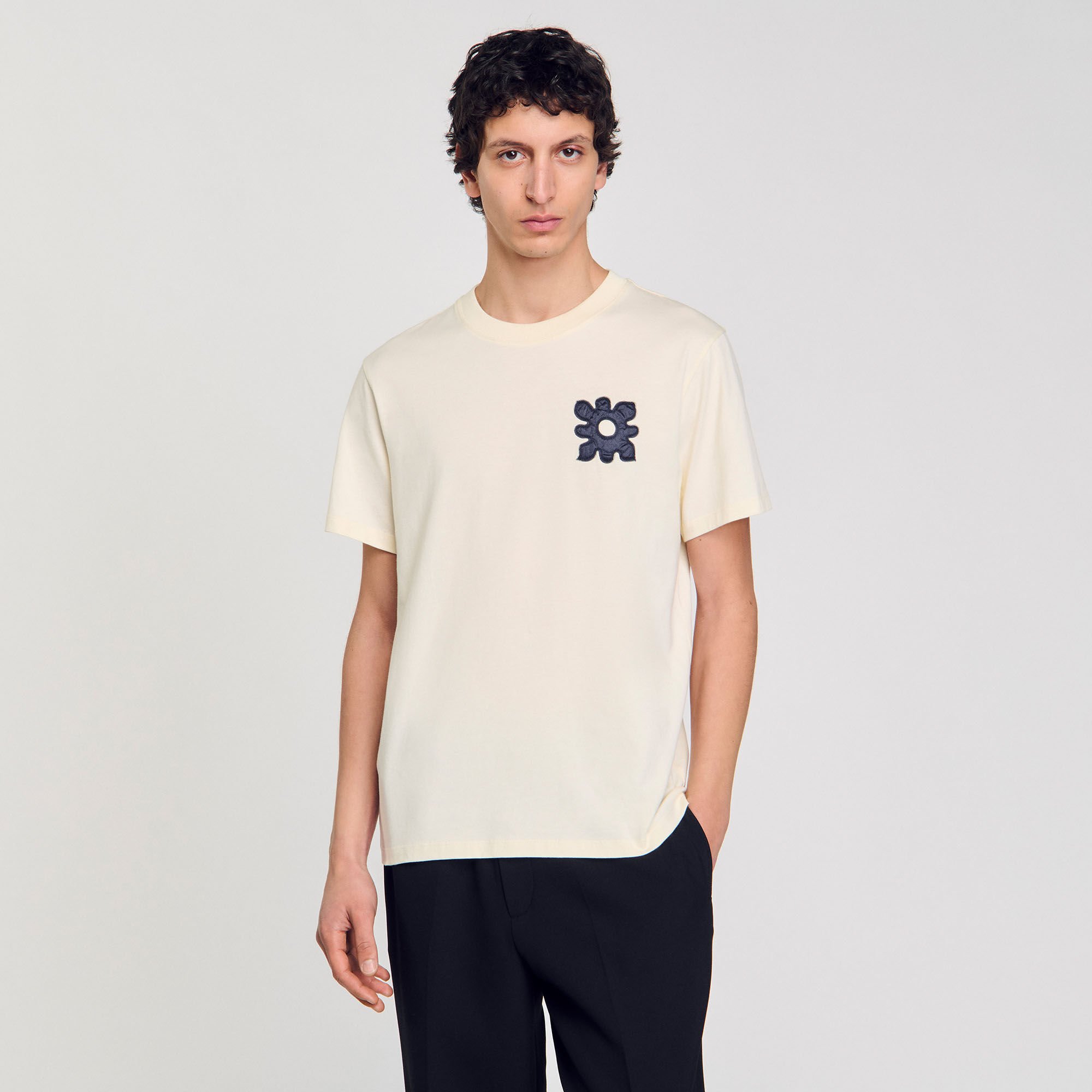 T-shirt con dettaglio a fiore