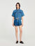 Shorts in denim con volant