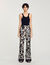 Pantaloni con stampa a fiori