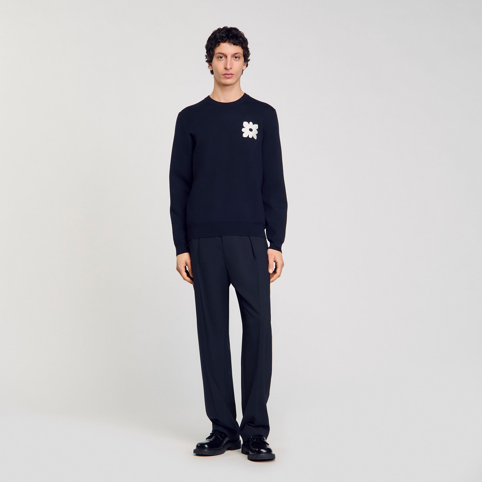 Maglione con dettaglio a fiore