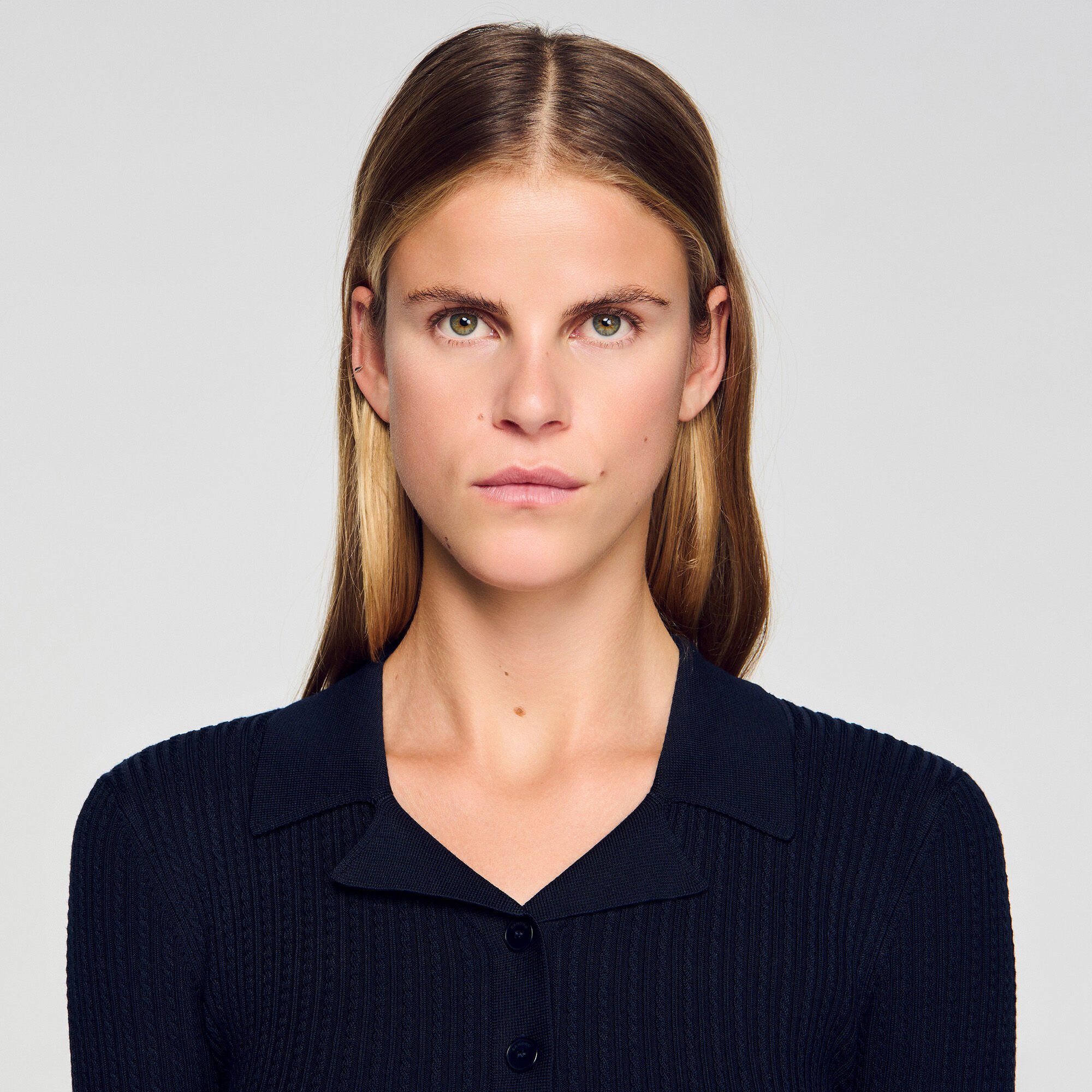 Cardigan corto con colletto polo