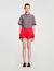 Shorts con volant
