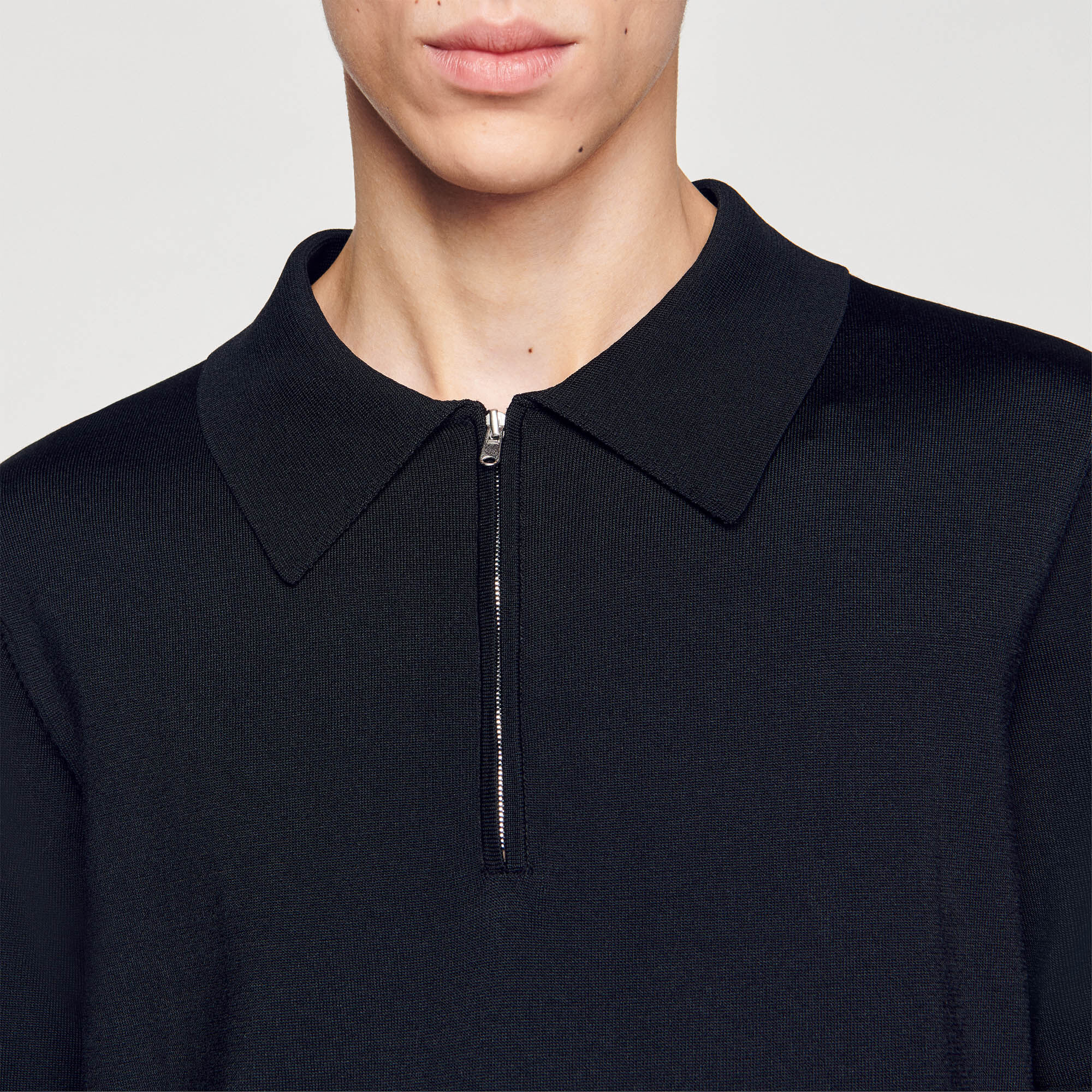 Polo in maglia con colletto con zip