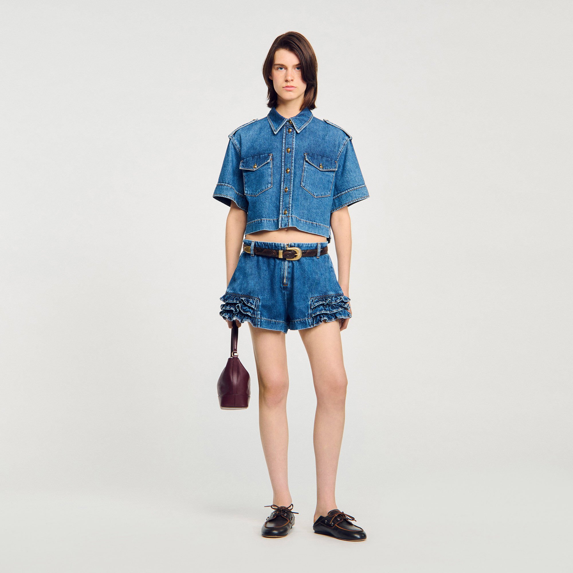 Shorts in denim con volant