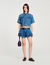 Shorts in denim con volant