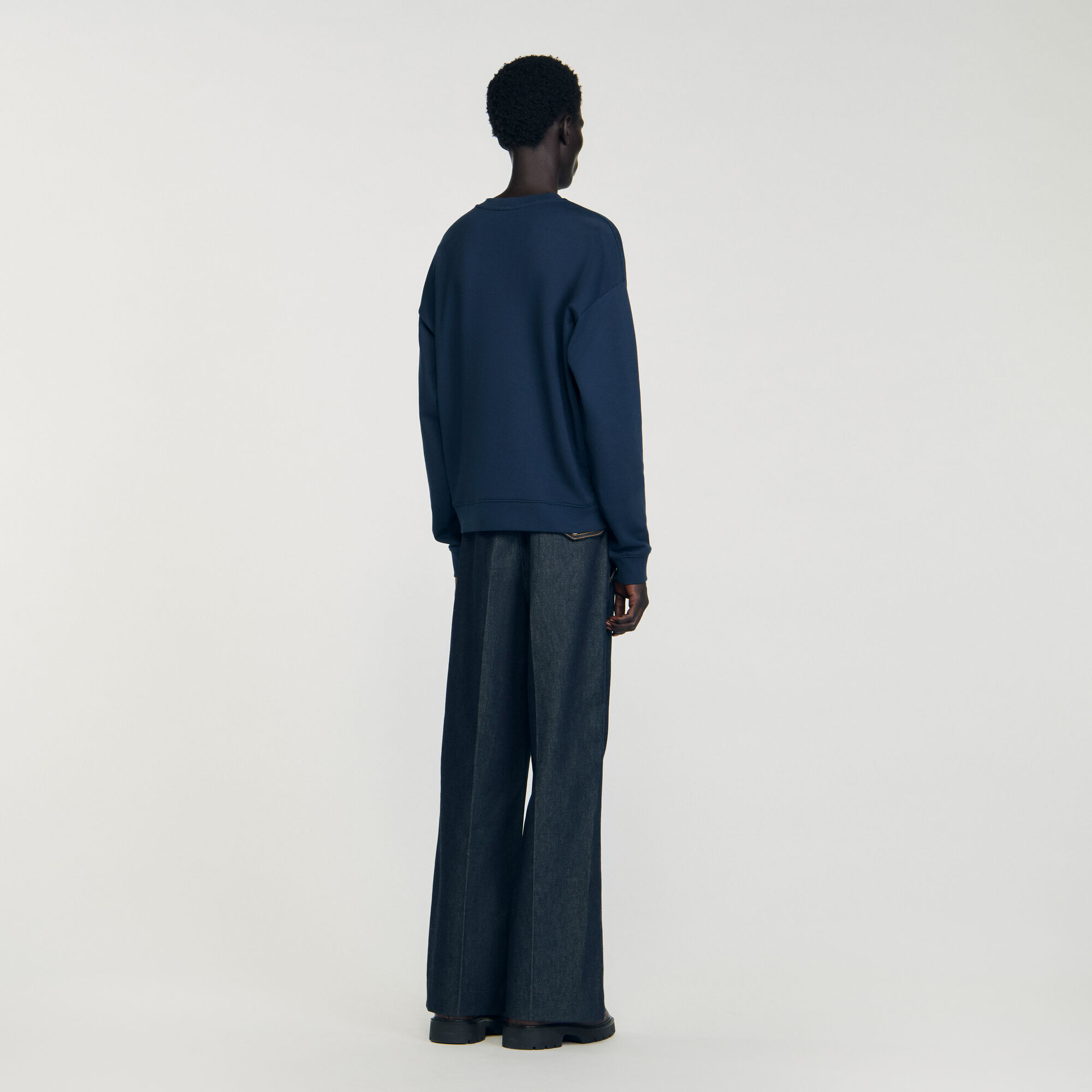 Felpa oversize con inserto in pelle