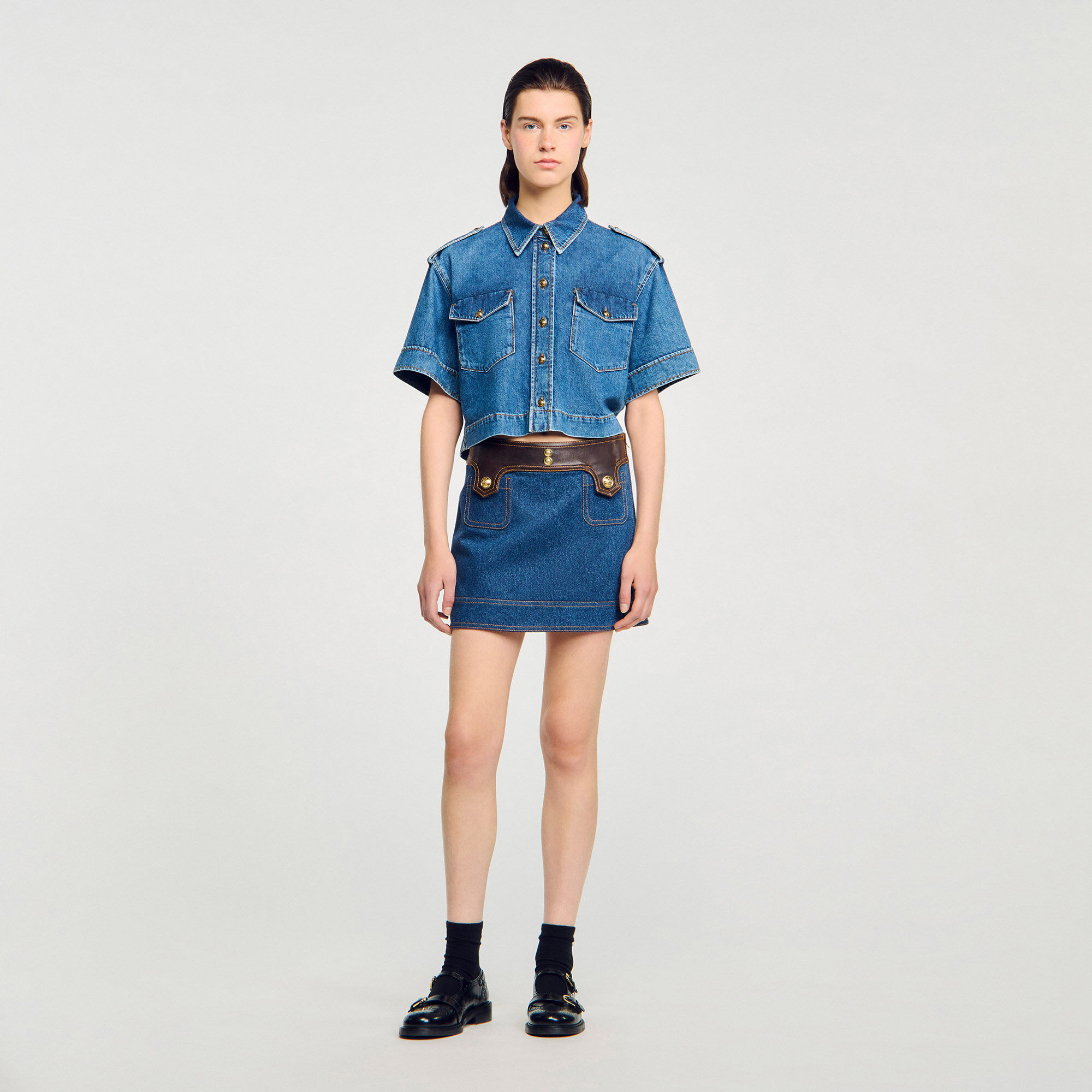 Gonna corta in denim e pelle