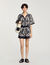 Shorts con stampa a fiori
