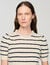 Maglione a righe e col perlinato
