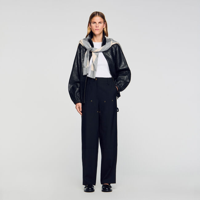 Pantaloni fluidi con rivetti