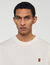 T-shirt con logo in pelle