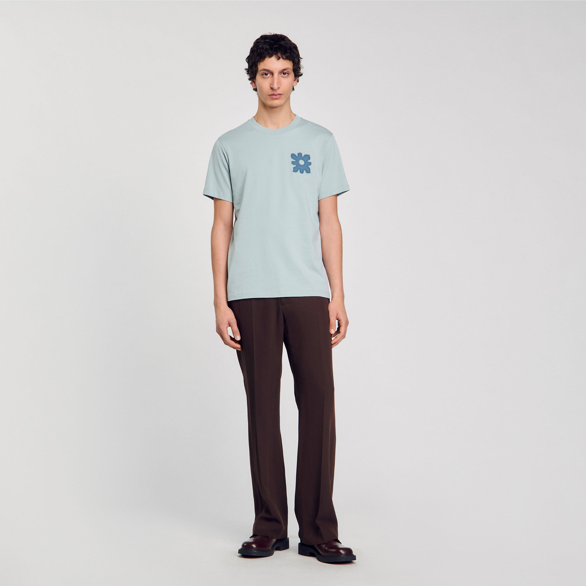 T-shirt con dettaglio a fiore