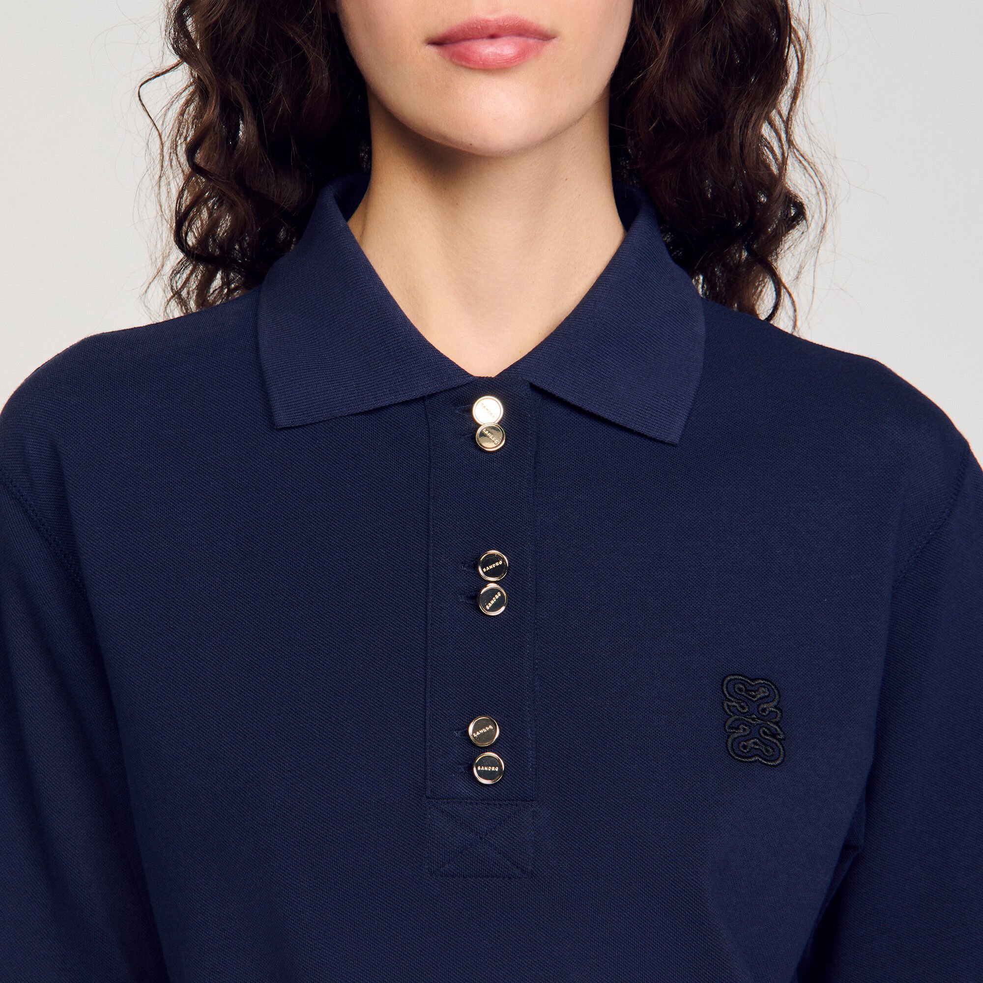 Polo con bottoni fantasia