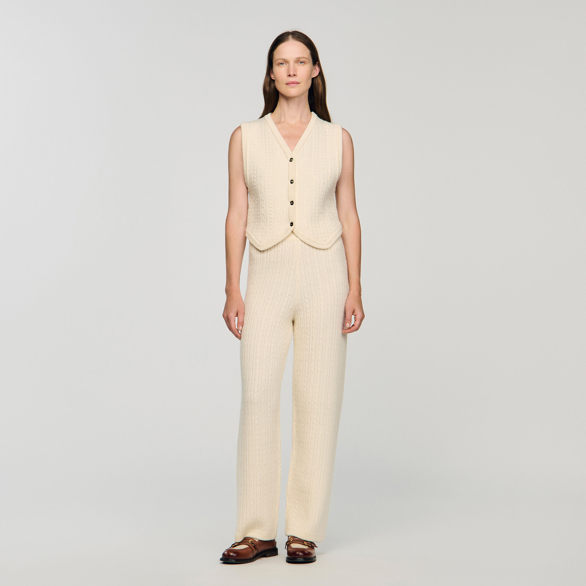 Pantaloni in maglia a trecce