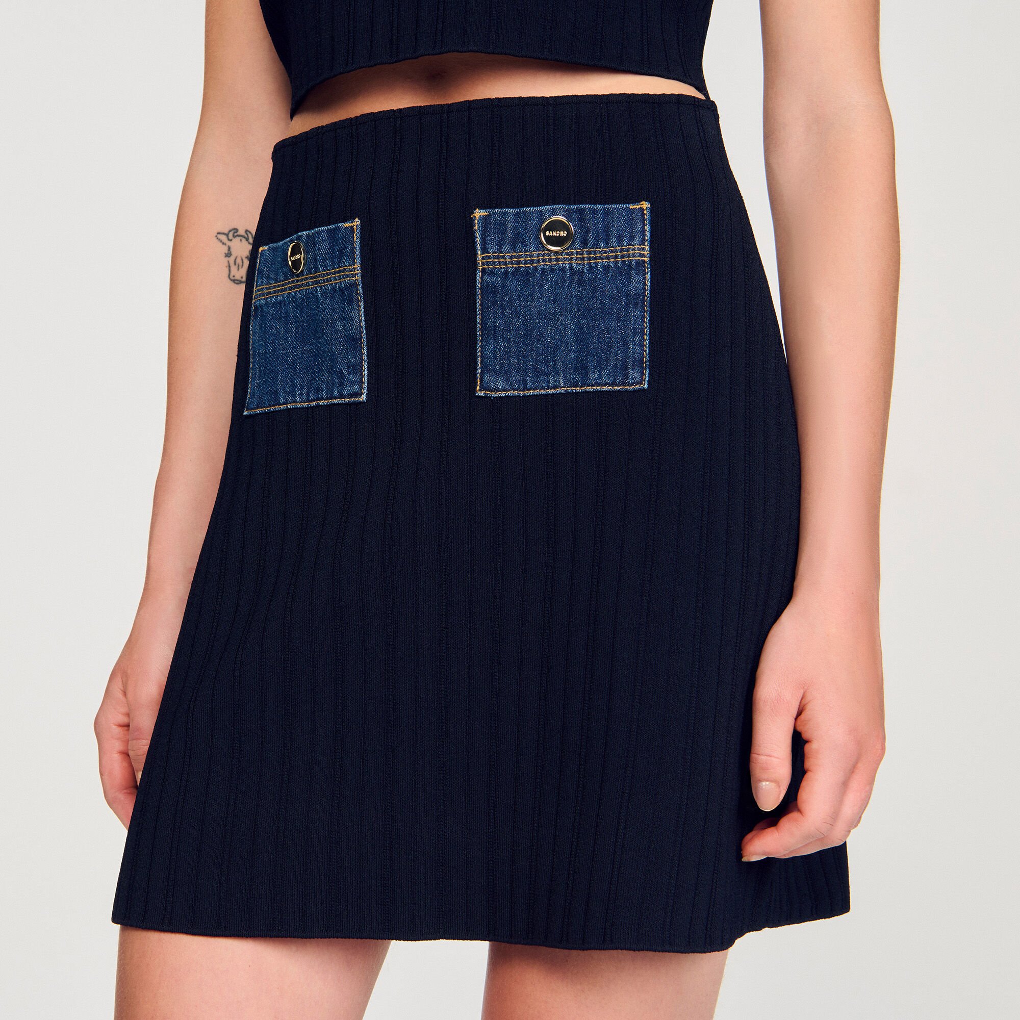 Gonna corta in maglia e denim