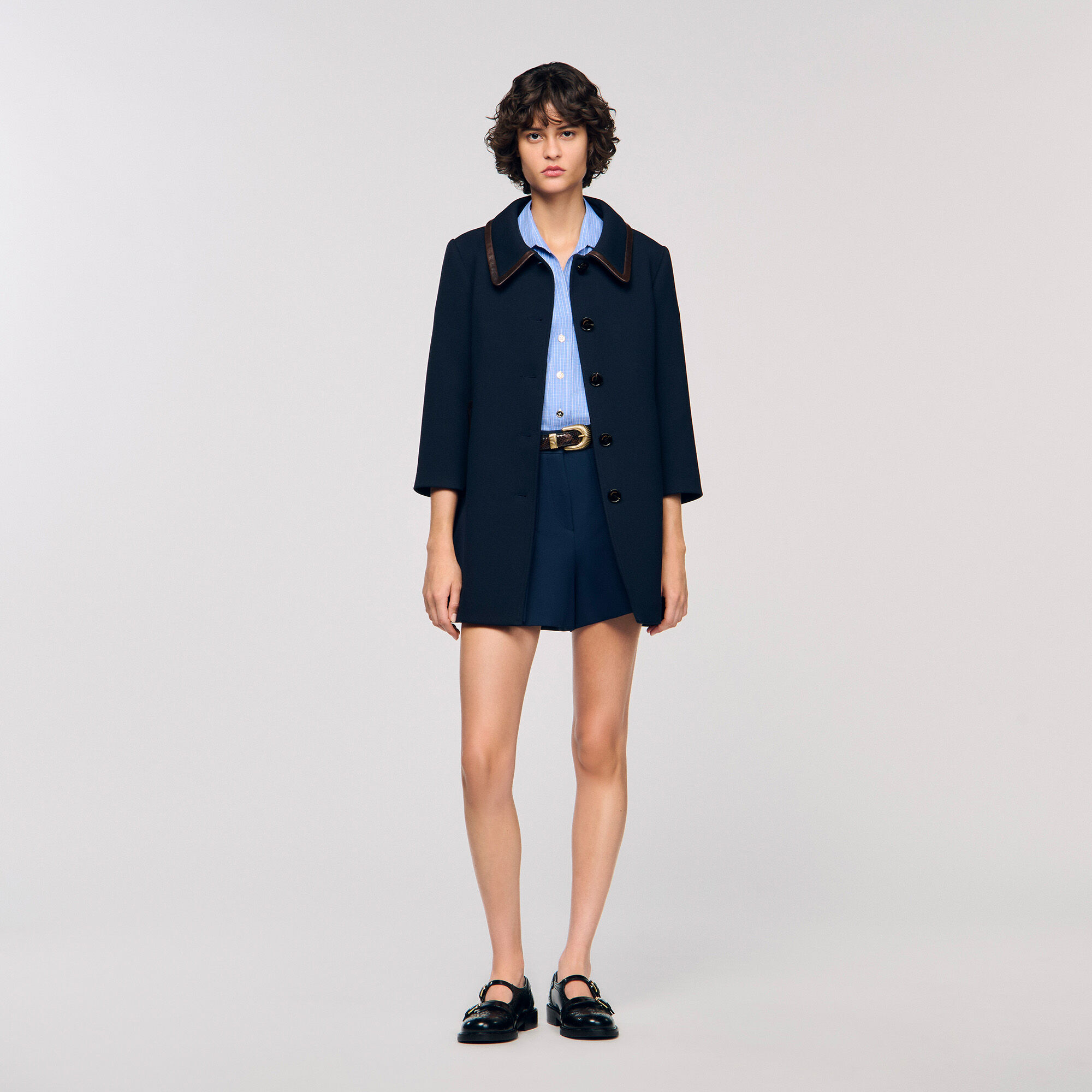 Cappotto con fasce in pelle