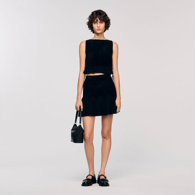 Top corto in maglia con volant