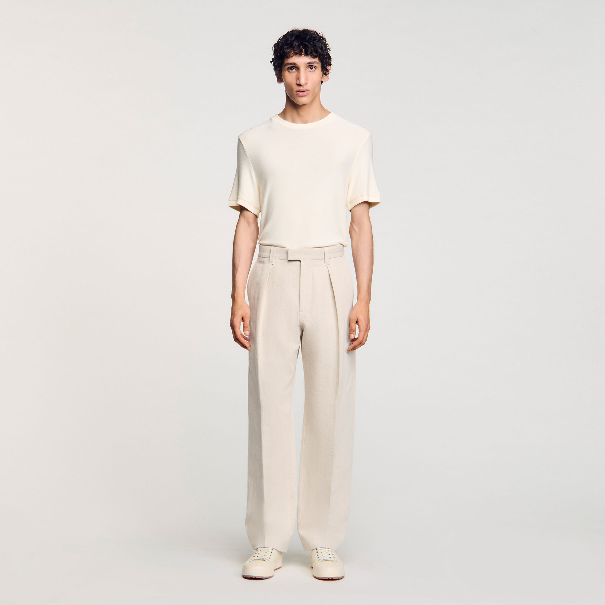 Pantaloni larghi con pieghe