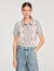 Maglione a rombi con colletto polo