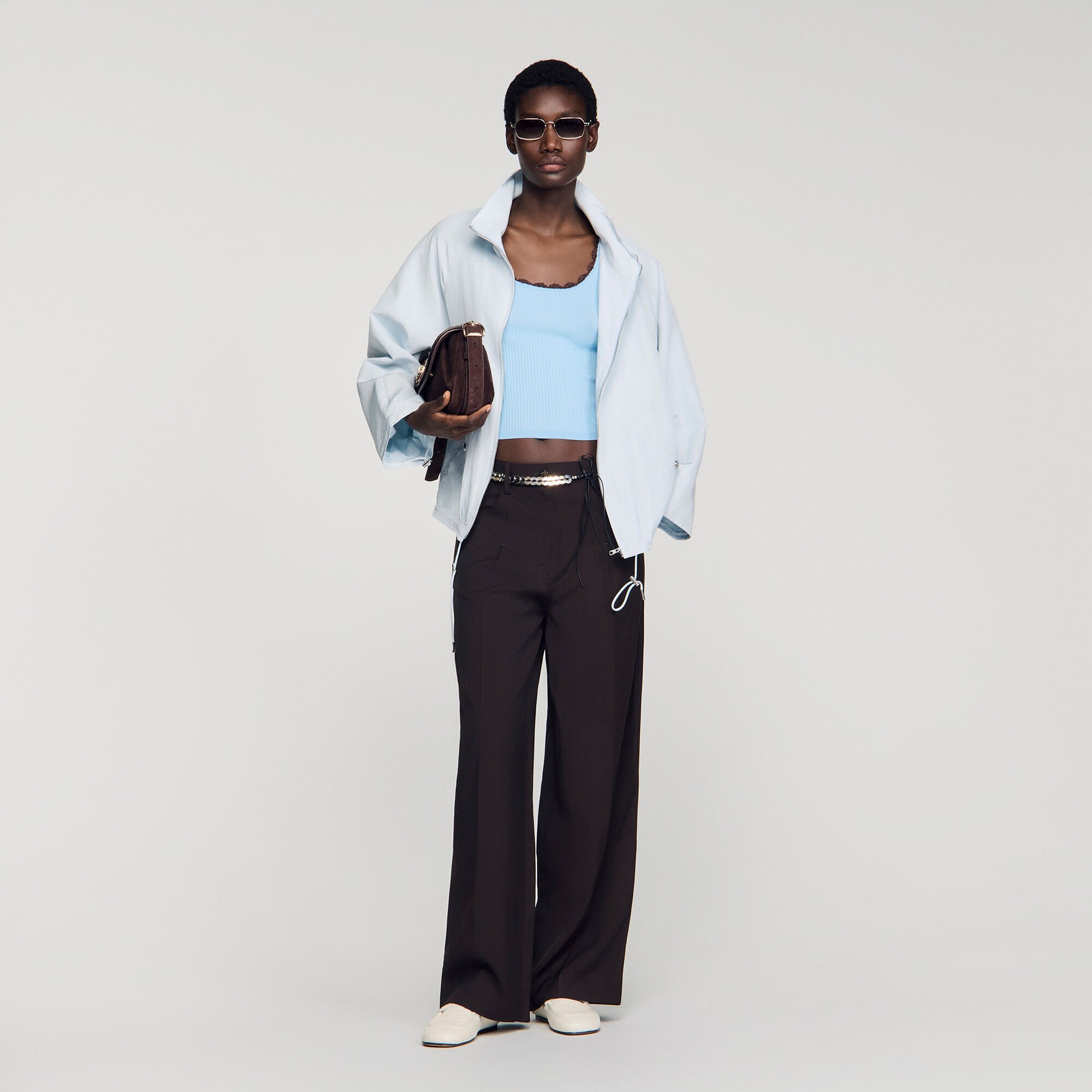 Top in maglia con dettagli crochet