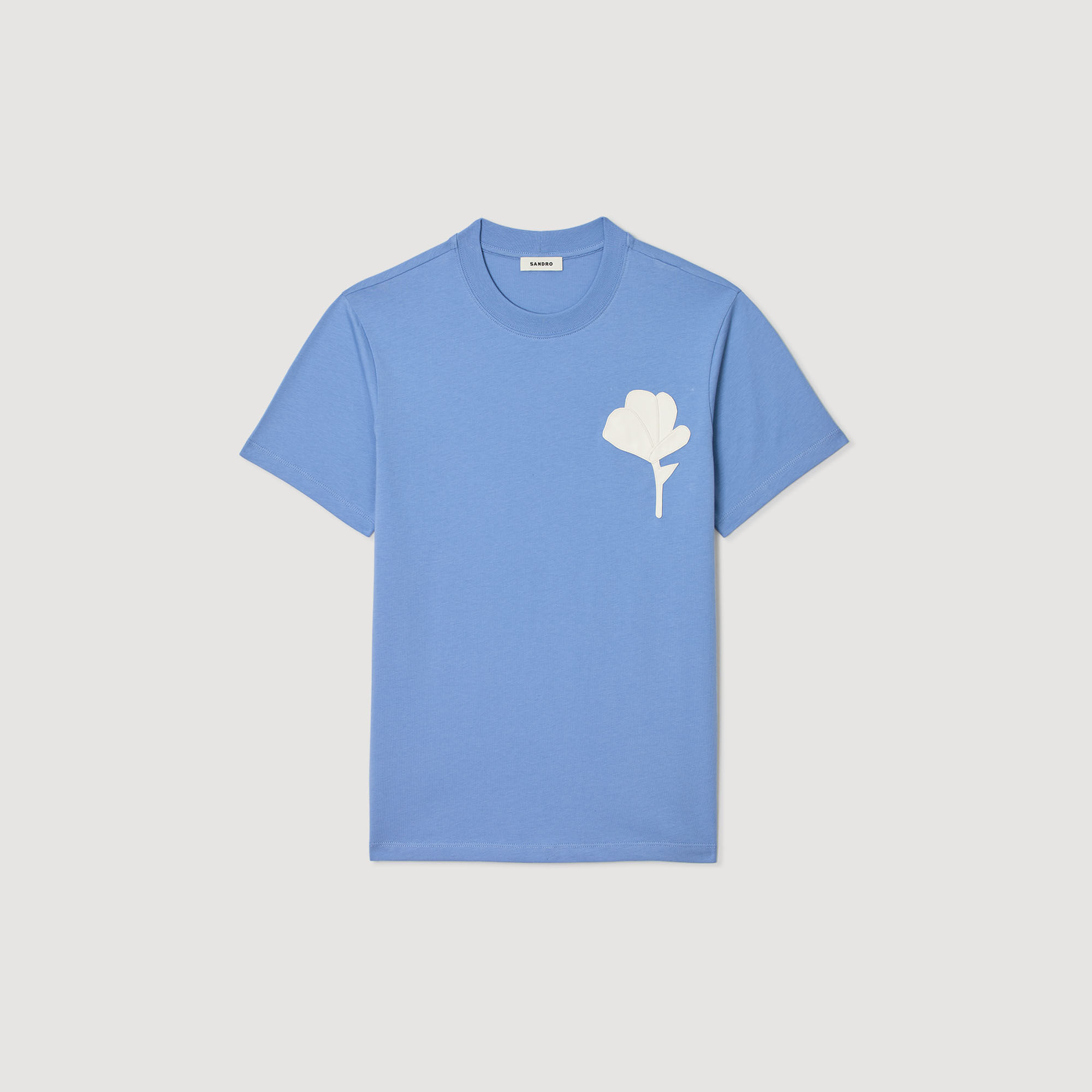 T-shirt con inserto a fiore