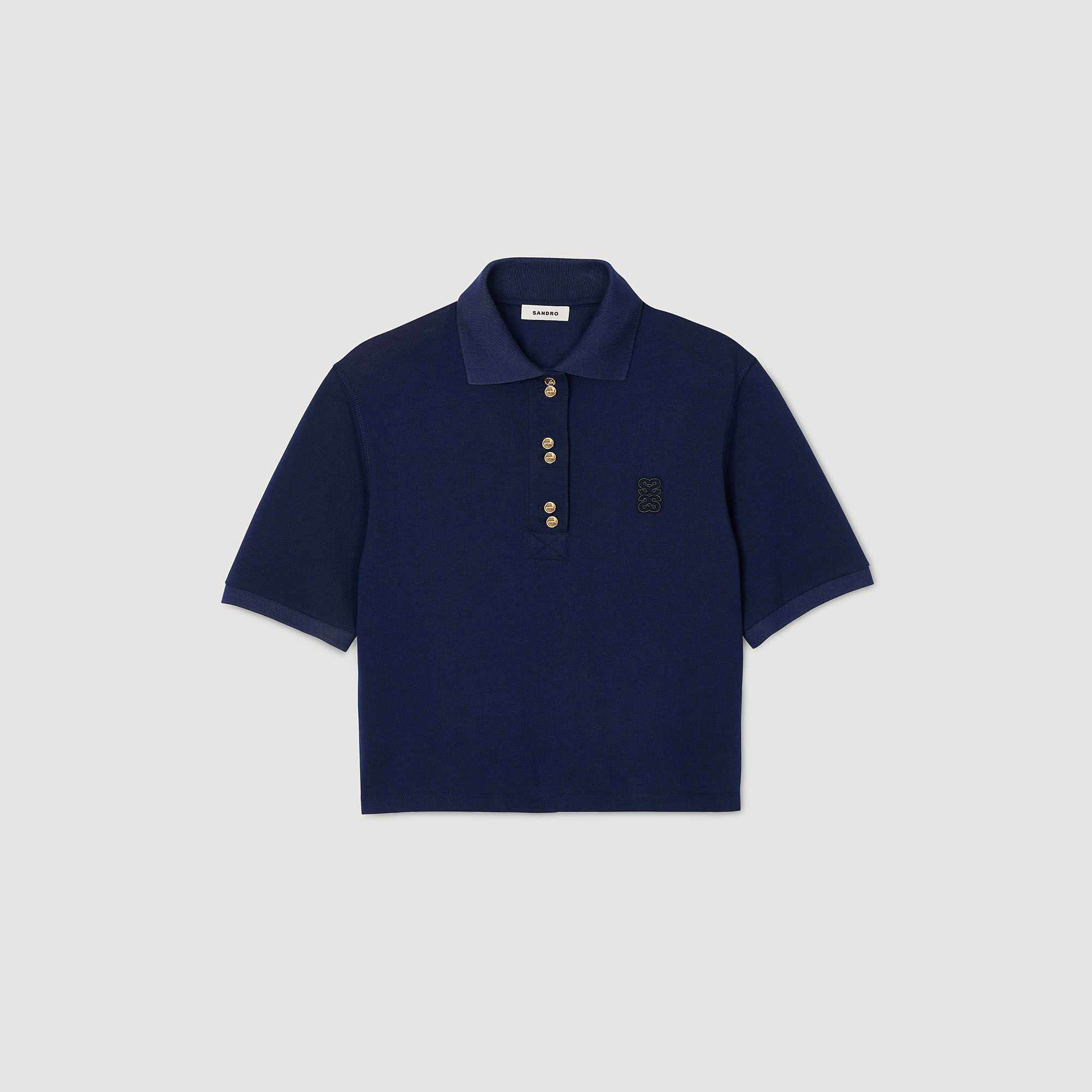 Polo con bottoni fantasia