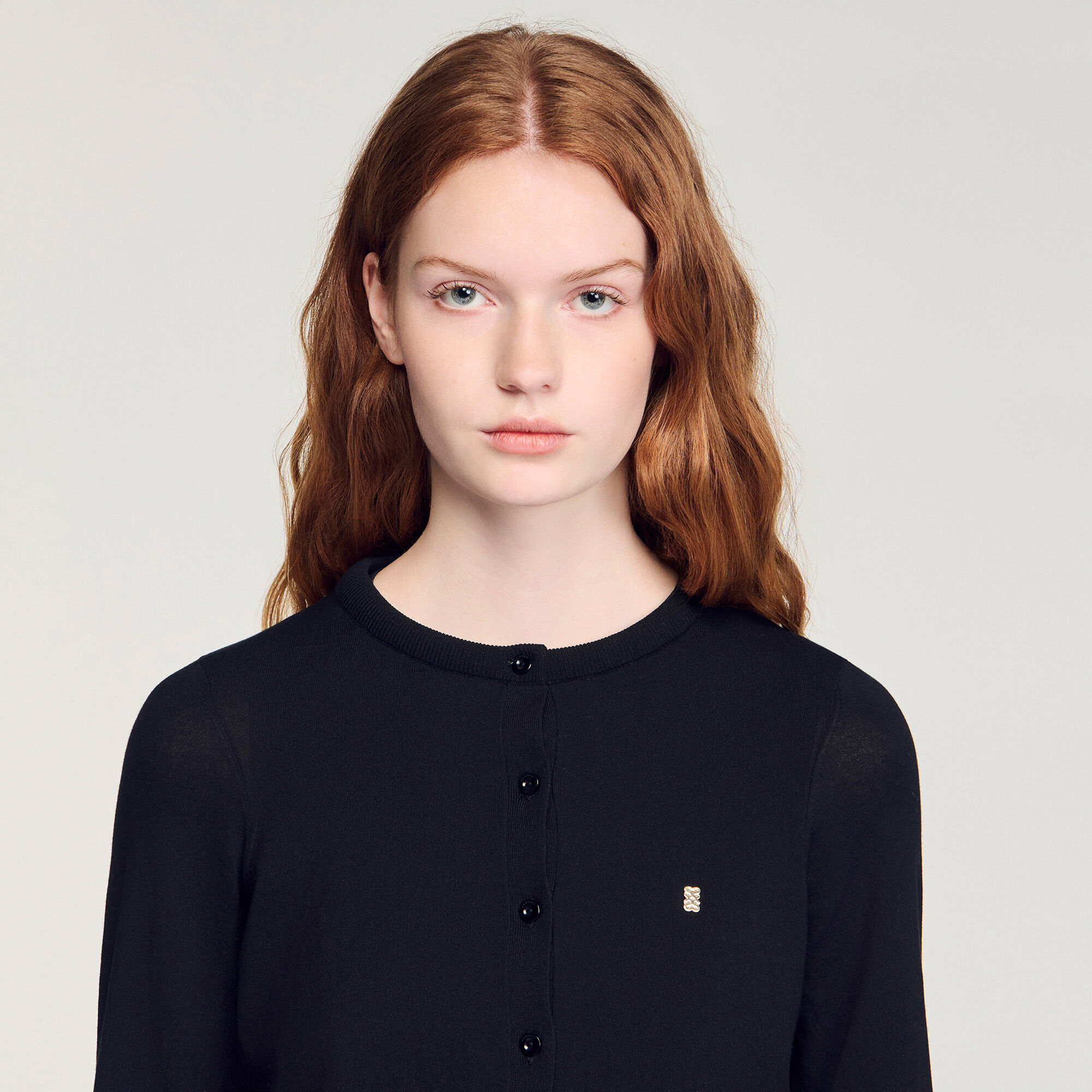 Cardigan corto girocollo imbottito