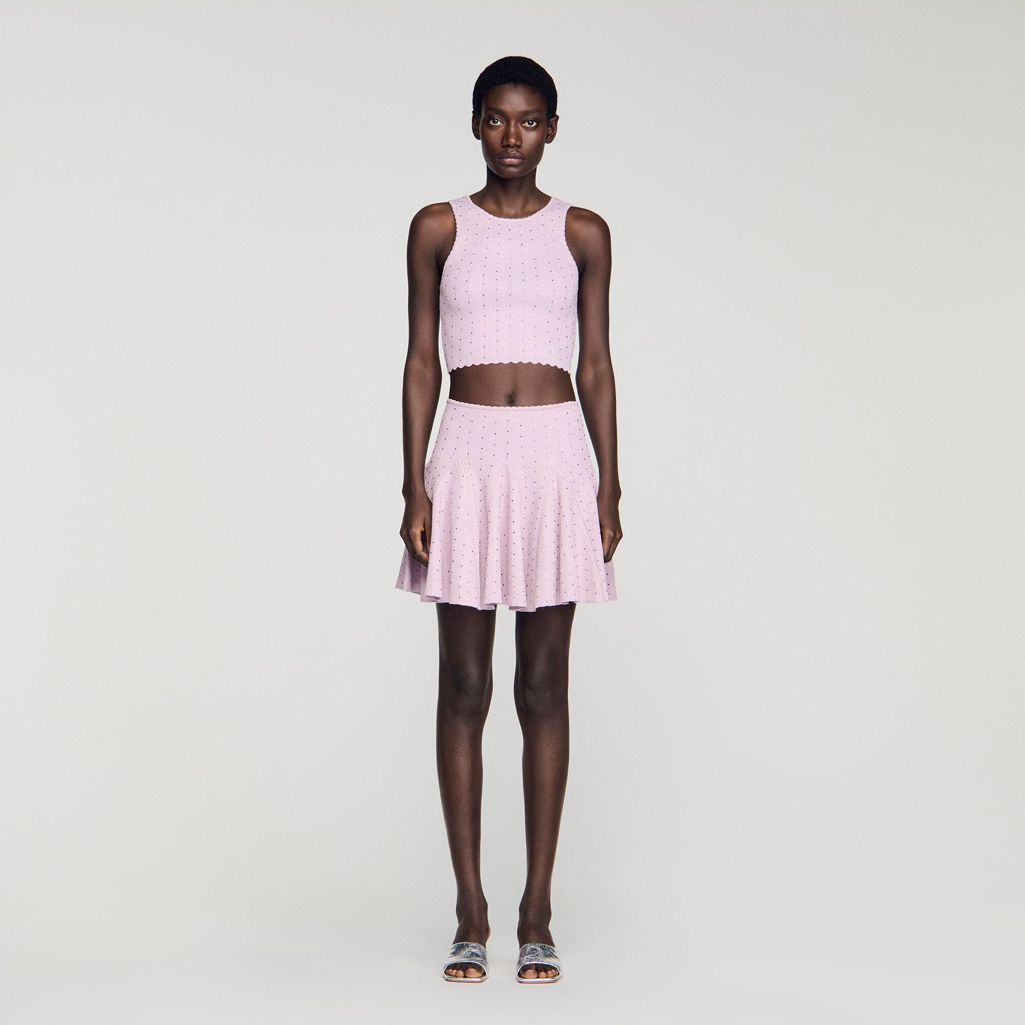 Gonna corta in maglia glitterata